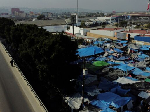 Some 22,000 migrants wait in shelters and makeshift camps in three cities in Mexico